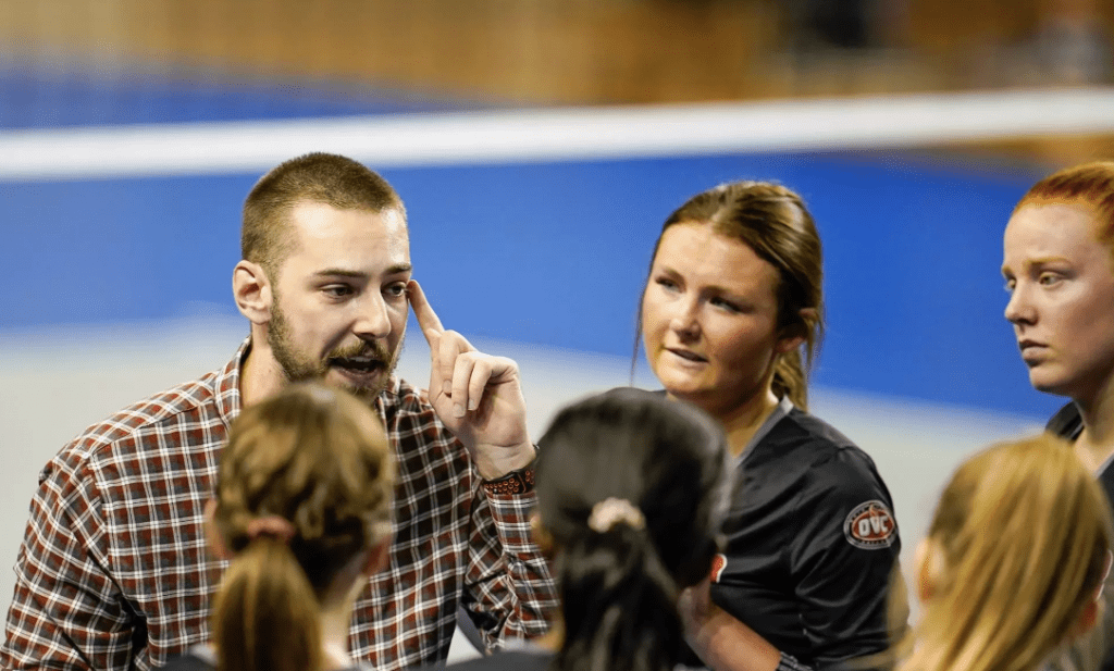 Matt Stolz as an assistant coach on the Redhawks volleyball staff.